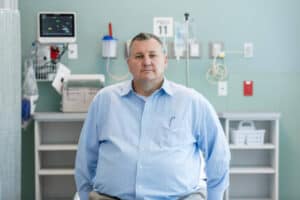 Man consulting doctor about what happens when stopping TRT
