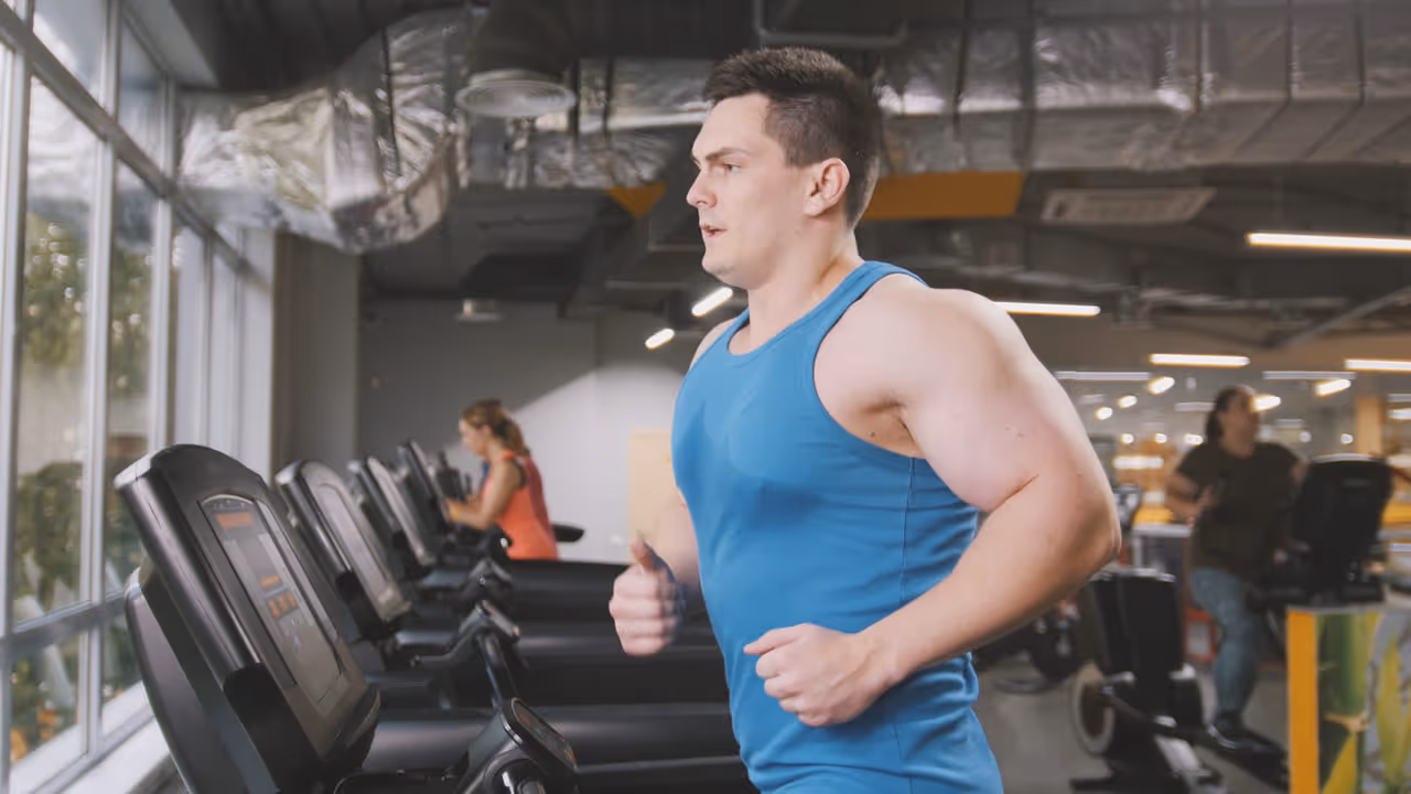 Man tracking weight loss progress while comparing liraglutide vs semaglutide