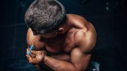 Man self-administering a steroid injection — professional steroid advice and harm reduction at Boost Health Clinic